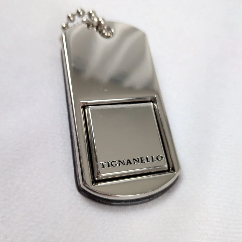 Tignanello Silver Tone Metal and Brown Leather Dog Tag Purse Charm Keychain